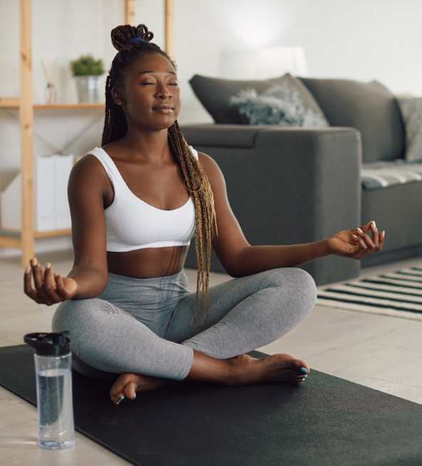 african american woman practicing yoga and healthy lifestyle habits